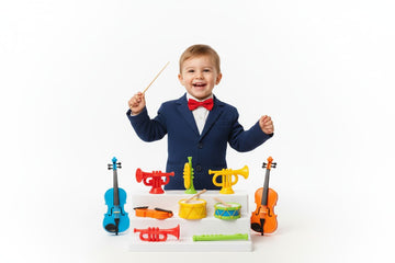 Niño dirigiendo una orquesta de juguete con batuta mágica - Director de Orquesta Hape E0642