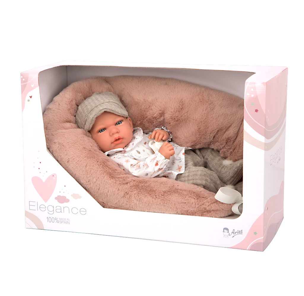 Muñeco con peso Andie de Muñecas Arias plácidamente recostado, fomentando el juego afectivo y el desarrollo real sin pantalla.