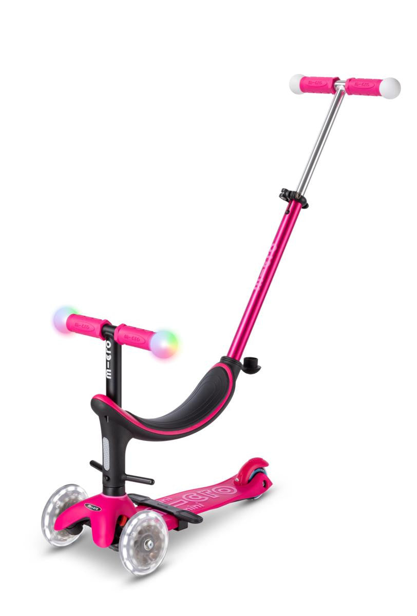 Micro Mini2Grow rosa con asiento y barra de empuje para padres