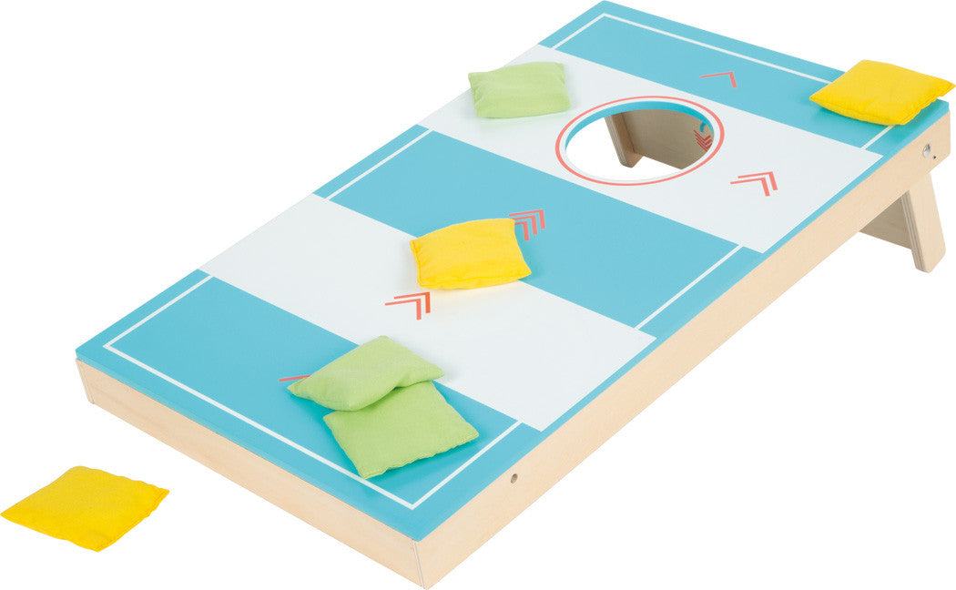 Juego de madera 2 en 1 de lanzamiento de Sacos cornhole y hockey - Small foot 12481