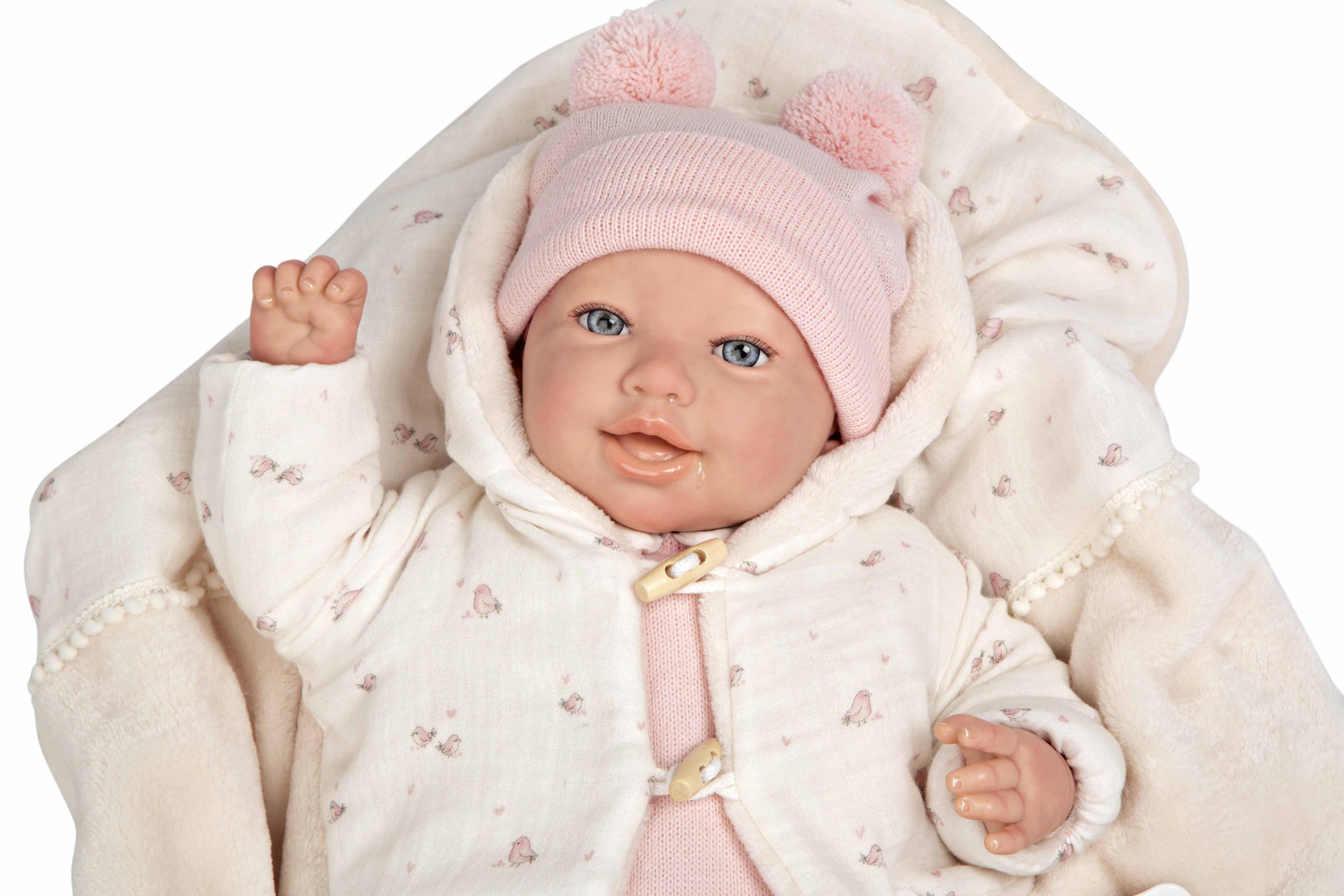 Primer plano detallado del rostro hiperrealista y la expresión dulce de la muñeca Reborn Elba de Arias.