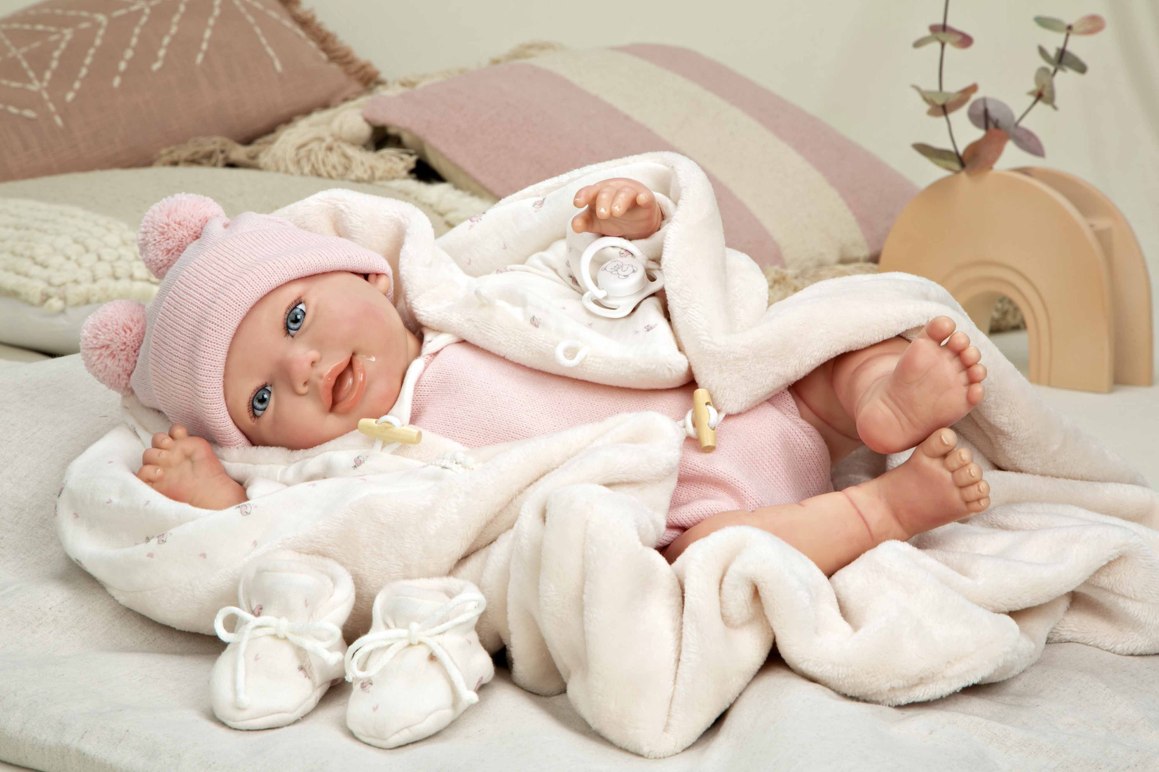 Muñeca Reborn Elba presentada en su empaque original expositor de Arias, juguetes que si aportan valor.