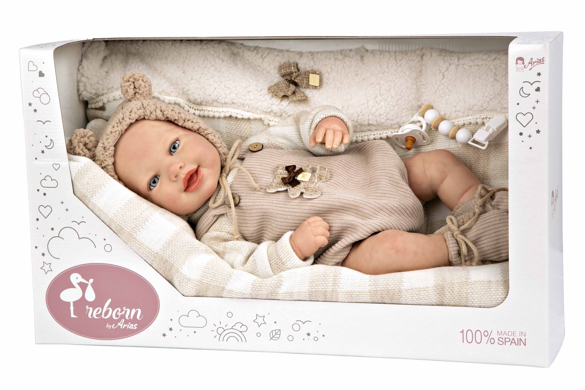 Muñeco Reborn Rubén presentado con todos sus accesorios en la caja original de Muñecas Arias, juguetes que si aportan valor.