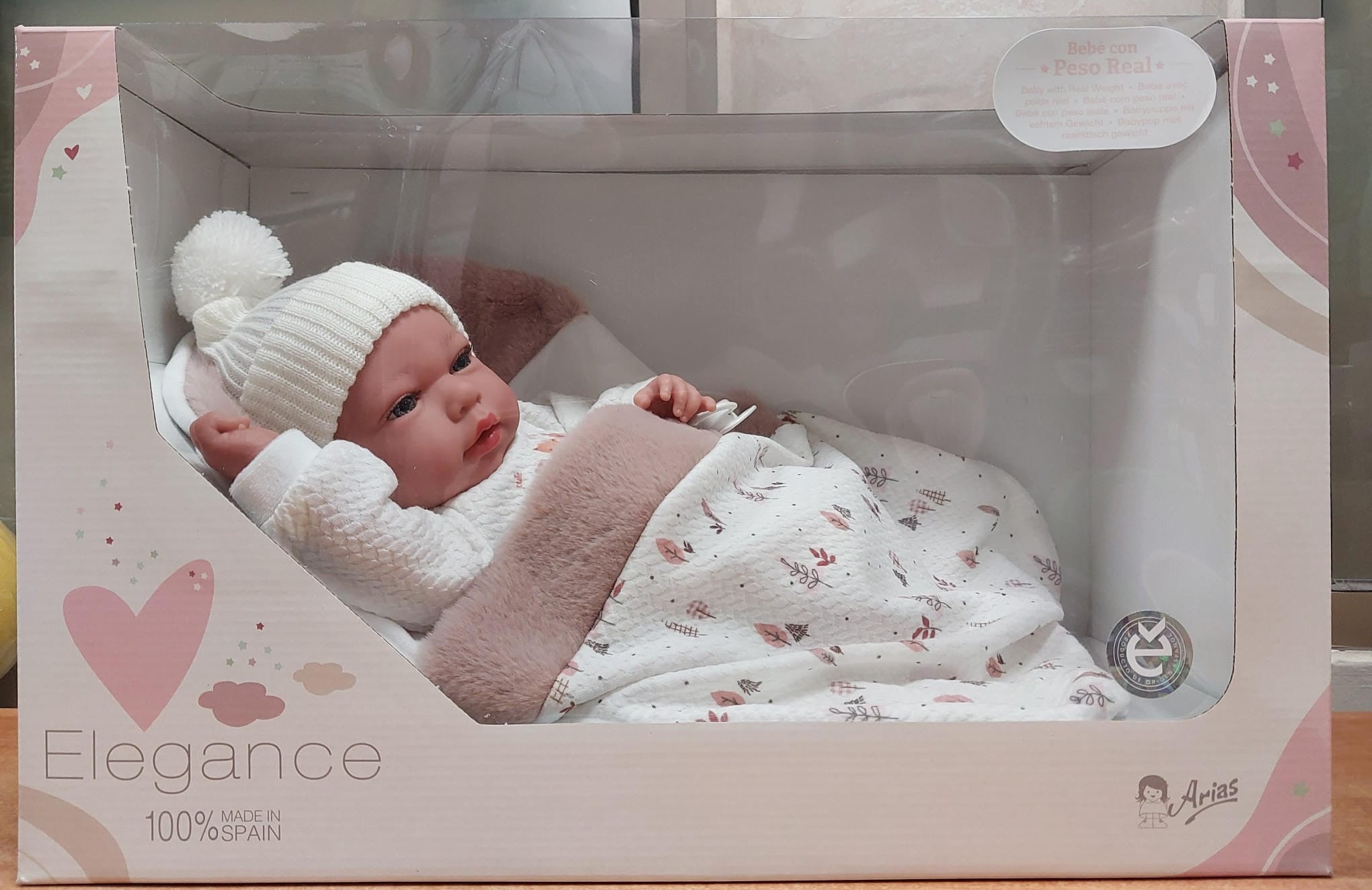 Muñeca elegance 40 cm andie rosa con saco - muñeco de peso - arias 60821