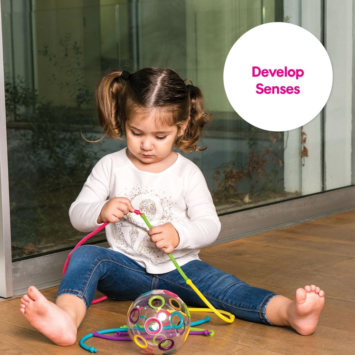 Juego de Motricidad - Thread-o-Ball - Bola con 10 Hilos Flexibles - Edushape