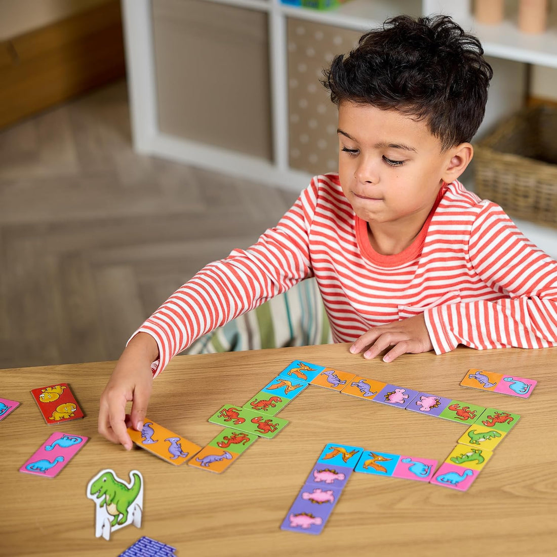 Mini juego de dominó de dinosaurios Orchard Toys para asociación y observación infantil - Educar Jugando - Orchard Toys