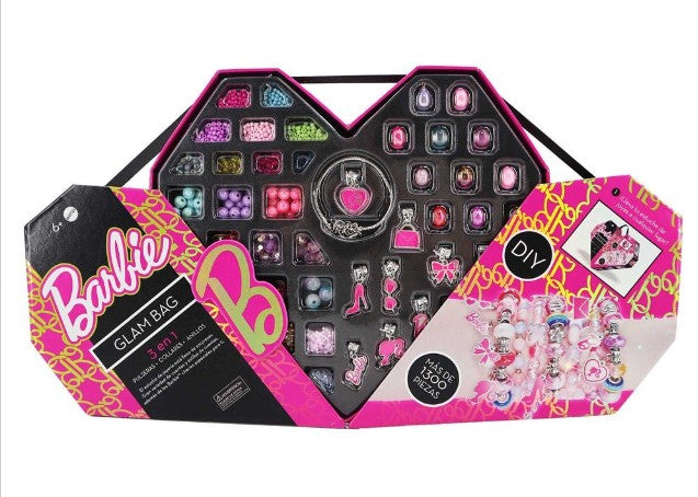 Estuche corazón del Estudio de Joyería Barbie cerrado, con asa de transporte y estampado rosa de Barbie