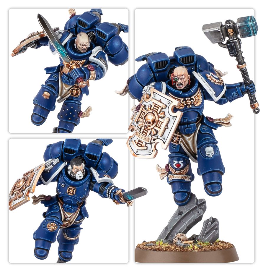 Miniaturas de Veteranos de Vanguardia Warhammer 40.000 vistas de cerca, con armas, escudos y propulsores.