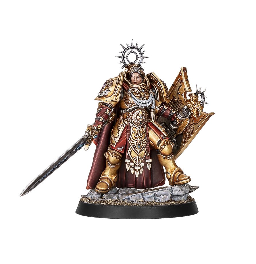 Capitán Escudo Custodes de Warhammer con cabeza descubierta, armadura dorada y capa roja, equipado con espada y escudo.