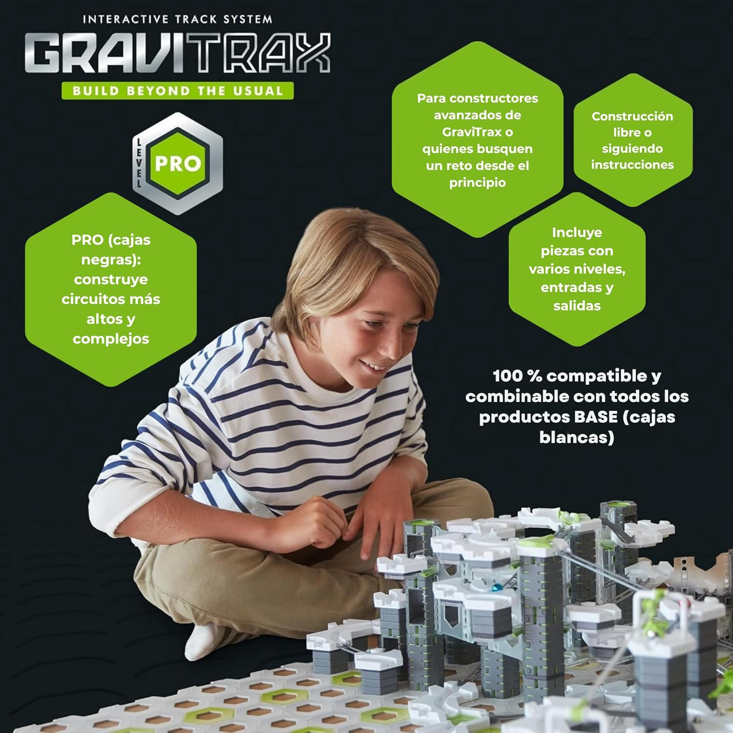 Nino montando circuito GraviTrax Pro Vertical - juego ingenieria construccion STEM ninos Espana