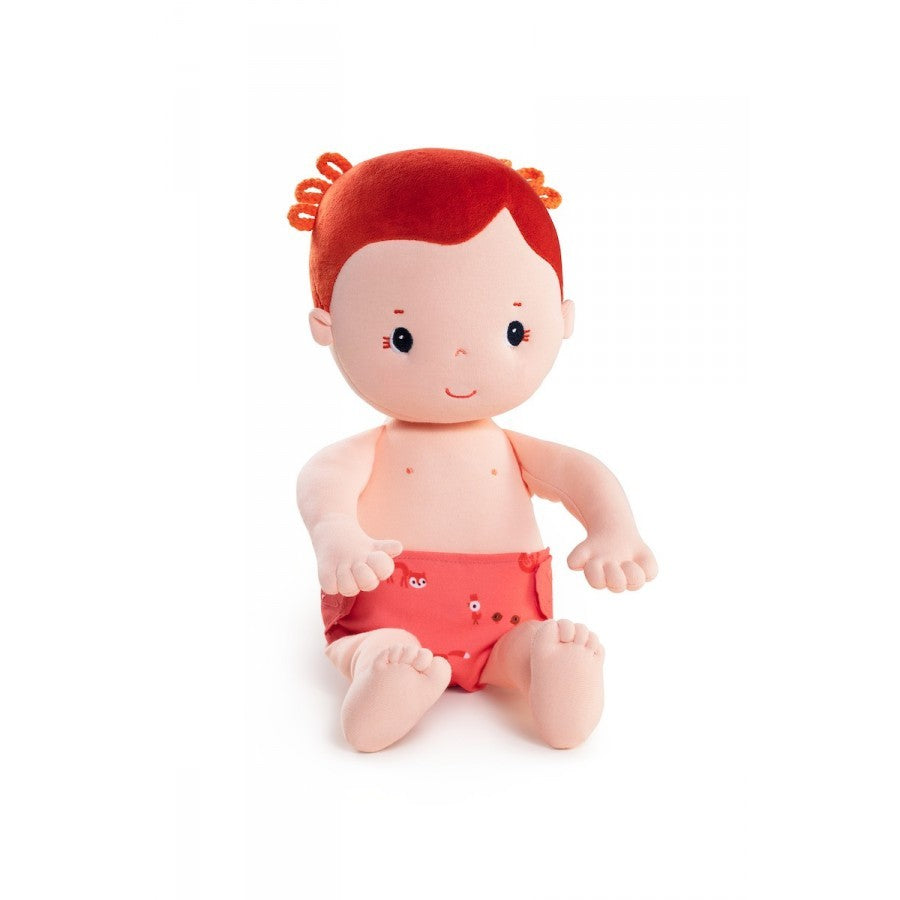 Detalle de accesorios intercambiables de la muñeca Rose Lilliputiens: pañal de tela y vestido rosa - Al mejor precio en nuestra tienda online