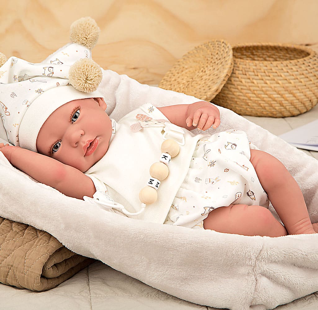 Muñeca Reborn Luna Arias 40 cm con pañal y manta nido rosa
